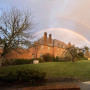 A rainbow over Corbett House at the Lewis & Clark Graduate School of Education and Counseling.