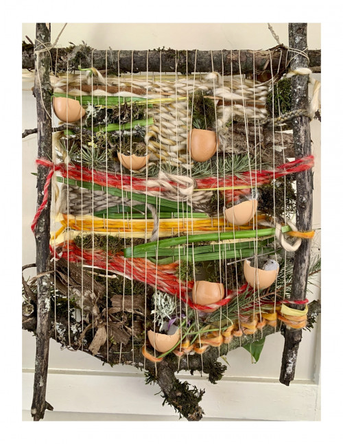 Title of the Artwork: InterwovenDimensions: 12”x24Materials: Found Nature, Yarn, Egg Shells, Hemp String