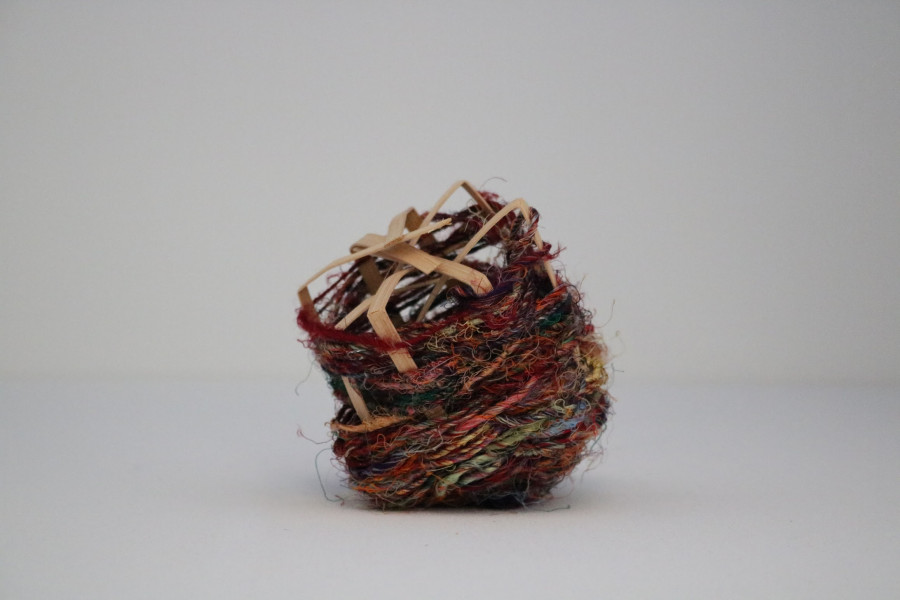Containment 1 (2021)  Flat reed and yarn  3”x3x4