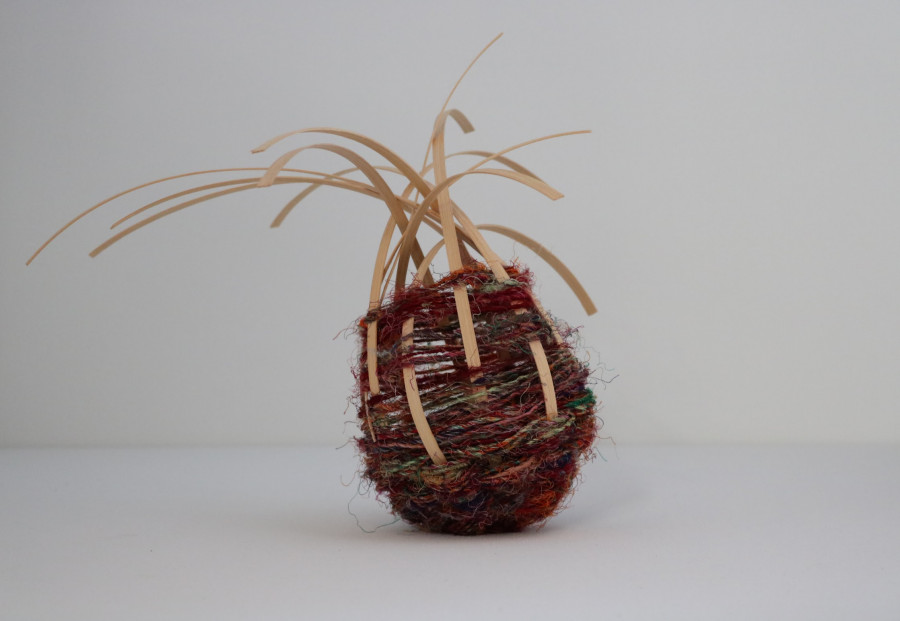 Containment 2 (2021)  Flat reed and yarn  7”x7x13