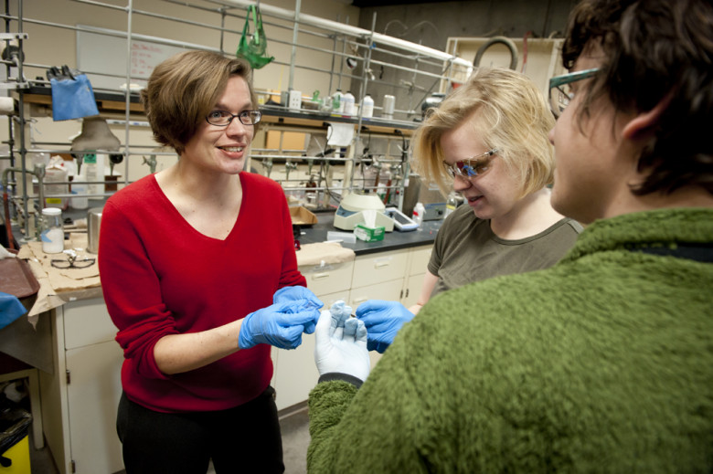 Chemistry Professor Anne Bentley, in the lab with undergrads.